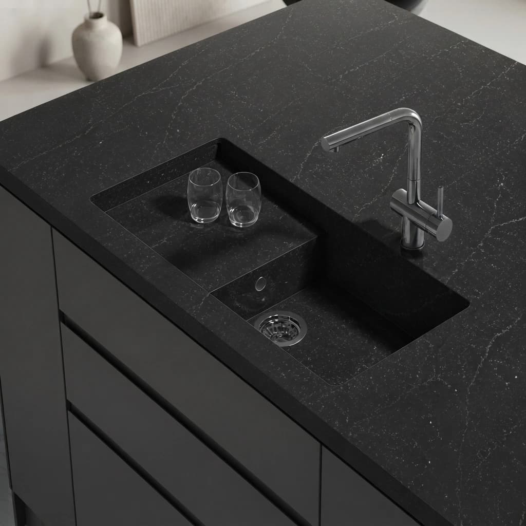 Black Silestone Romantic Ash countertop with integrated sink, faucet and two glasses