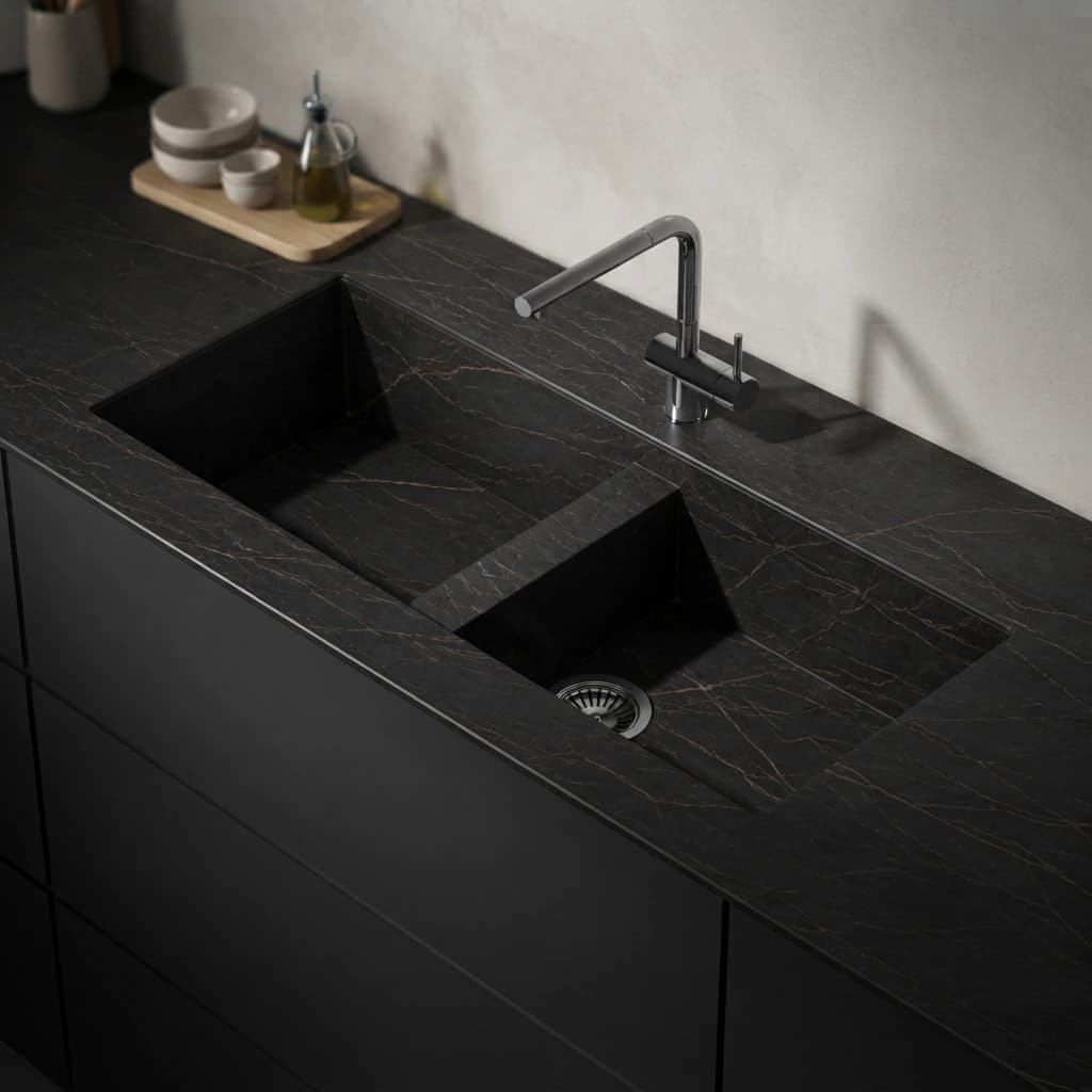 Black Dekton Laurent Vadella worktop with light veining, double sink and tap